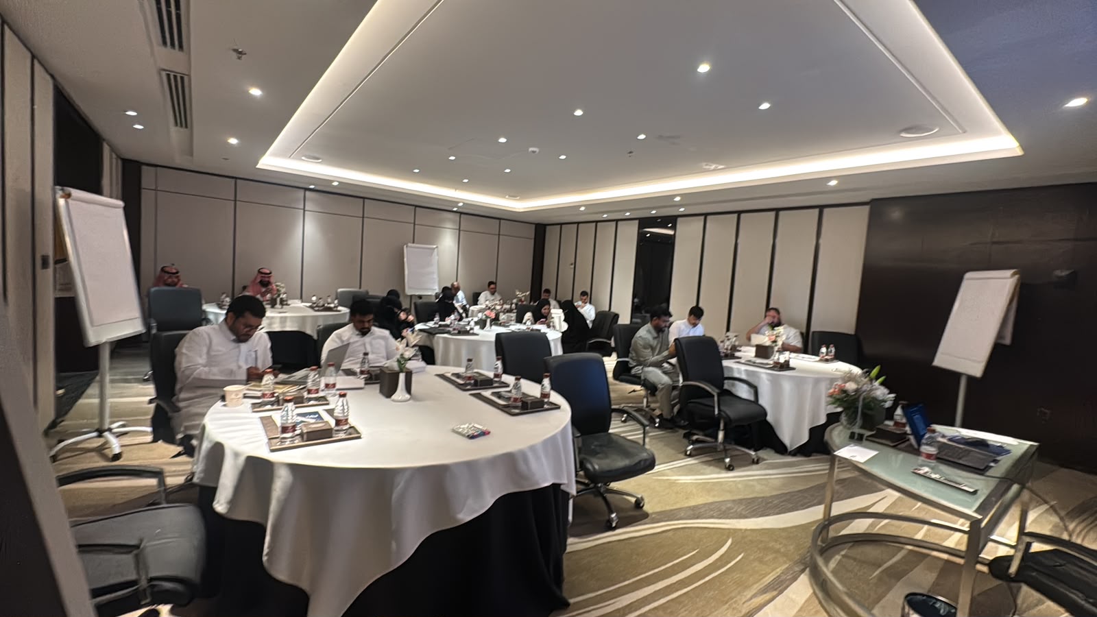 Participants working together during an in-person training workshop.